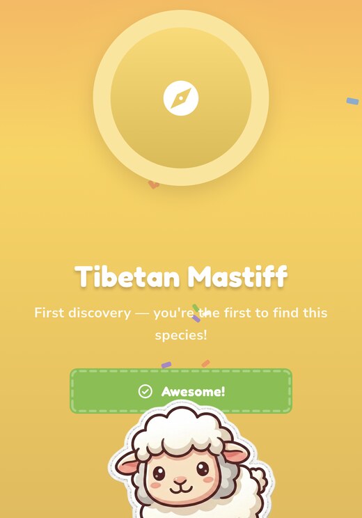 Achievement unlocked screen — first discovery of a Tibetan Mastiff